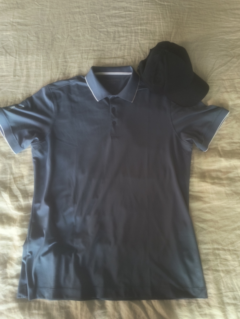 Galvin Green golf shirt and hat